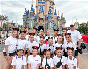 WVMS Cheer team at Disney in front of the Castle in 2023.